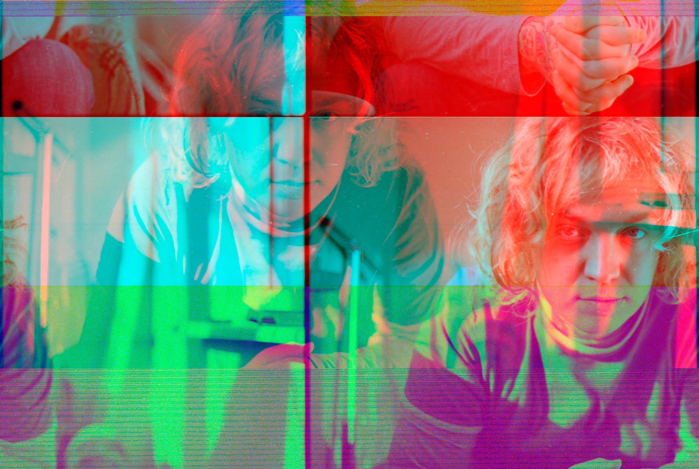 Colorful glitch-art portrait of a man with distorted digital overlays symbolizing manipulated deepfake video